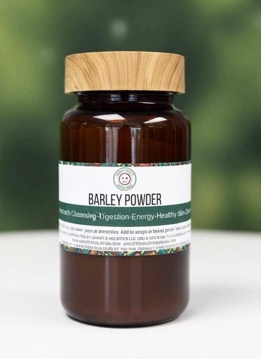 Organic barley grass powder in a wooden bowl with green superfood smoothie and fresh barley grass