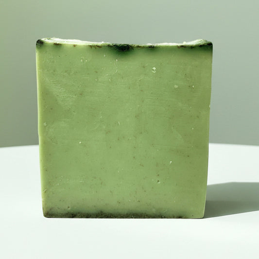 Plant-based tea tree spirulina shea butter soap for acne-prone skin, dark spots, oily skin, and deep cleansing hydration.